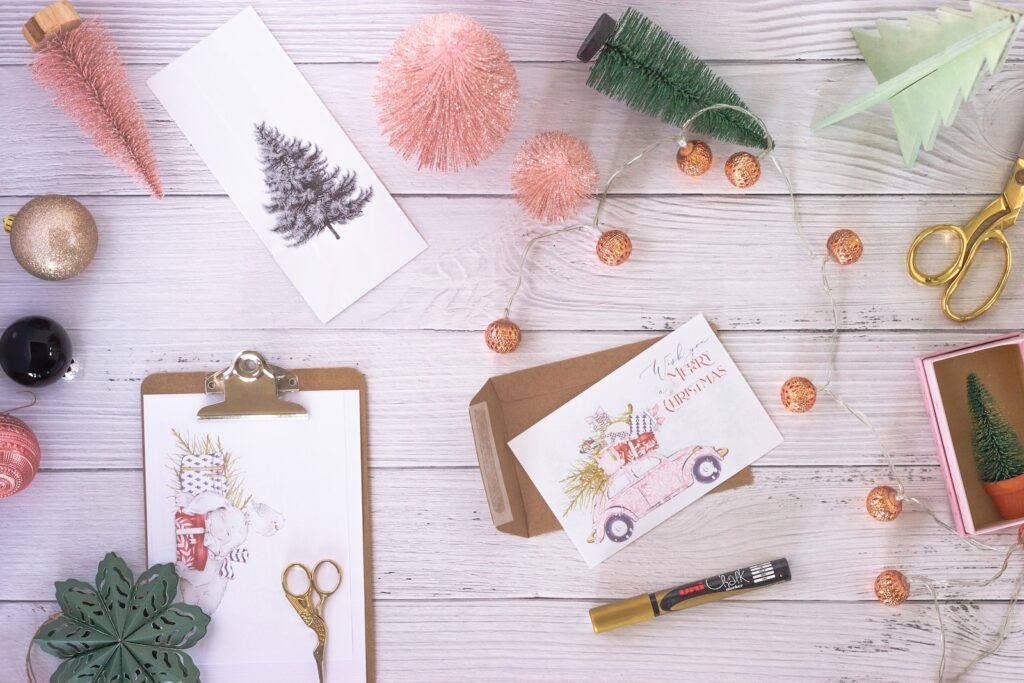 white greeting card on brown wooden table